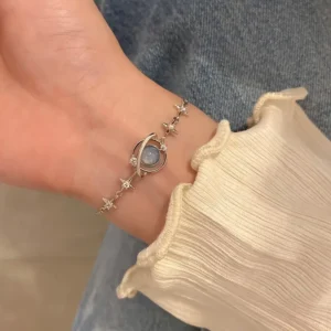Elegant Celestial Charm Bracelet for Women - Unique Star and Planet Design with Sparkling Rhinestone Accents, Zinc Alloy, Perfect for Daily Wear or Parties, Celestial Jewelry
